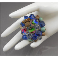 Load image into Gallery viewer, Large Vintage German Givre Glass Cluster Brooch - Carved Art Glass, Flocked Metal and Plastic Beads on Gold Tone Brass Filigree Pin - Blue Green Pink - West Germany