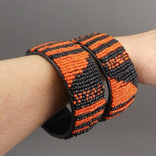 Load image into Gallery viewer, Pair of Vintage Zulu African Maasai Beaded Bracelets - Orange and Black Glass Seed Bead Stacking Bangles - Handmade Ethnic, Tribal, Jewelry
