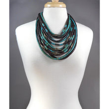 Load image into Gallery viewer, Vintage Gerda Lynggaard Monies, Denmark Multi Strand Necklace - Danish Artisan Jewelry - Carved Horn Clasp, Brown and Turquoise Coconut Beads, Stamped Brass Cones - circa 1970/1980