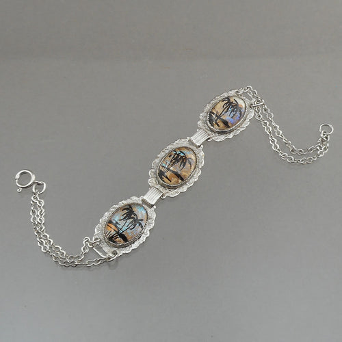 Vintage Morpho Butterfly Wing Reverse Hand Painted Glass Bracelet - circa 1940 - Silver Tone Chain - Tropical Scenes