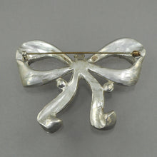 Load image into Gallery viewer, Large Vintage Art Deco Era Bow Brooch Pin - Clear and Green Faux Emerald Rhinestones Paste - Silver Pot Metal Ribbon Setting