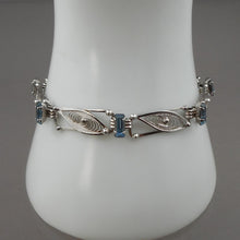 Load image into Gallery viewer, Vintage Sterling Silver Filigree Link Bracelet with Emerald Cut Blue Topaz Stones