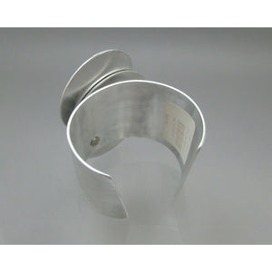 Textured Aluminum Bracelet Tagged CAC Store Circo Tierras Silver Red Fabric Cuff