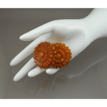 Load image into Gallery viewer, Pair of Vintage 1930s Bakelite Dress Clips - Marbled Apple Juice Carved Plastic - Flower Design - Simichrome Tested