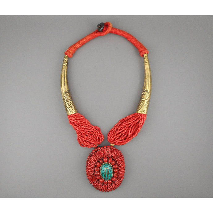 Bajalia Kanalai Indian Glass Seed Bead Necklace - Brass Horns, Faux Coral and Turquoise Pendant - Multi Strand Statement Piece with Cording and Stamped Metal