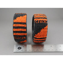 Load image into Gallery viewer, Pair of Vintage Zulu African Maasai Beaded Bracelets - Orange and Black Glass Seed Bead Stacking Bangles - Handmade Ethnic, Tribal, Jewelry