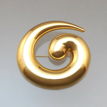 Load image into Gallery viewer, A large scale vintage gold tone statement brooch. Signed designer pin by Monet in a Modernist design. Works well as a scarf holder too. Approximately 2 1/4&quot; x 2 1/8&quot;. Excellent vintage pre-owned condition. Barely, if ever, worn. FREE Shipping to US locations