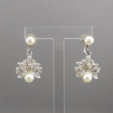 Load image into Gallery viewer, A pair of vintage silver tone, faux pearl and rhinestone dangle earrings. Circa 1960, maker unknown. Screw backs for non pierced ears. Each approximately 5/8&quot; x 1 1/8&quot;. Excellent vintage pre-owned condition with all stones in place. FREE Shipping to US locations