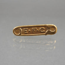 Load image into Gallery viewer, Vintage Enfamil Advertising Baby Diaper Pin - EFC Infant Formula, Gold Tone Setting  Approximately 1/4&quot; x 1&quot;  Excellent vintage pre-owned condition.  Refer to the images above to see fine details and further assess the condition of this item.  FREE Shipping via USPS standard shipping to Continental US locations