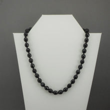 Load image into Gallery viewer, A vintage single strand necklace of French jet (black glass) beads. Collar length with faceted round and seed beads.  Approximately 18 1/2&quot;  Vintage pre-owned condition commensurate with age and use. Some of the beads have imperfections and small nicks in the surface. FREE Shipping to US locations