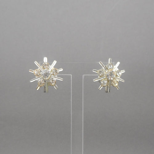 Vintage screw back snowflake earrings, signed NEMO. Circa 1950 with round rhinestones set in silver tone metal, for non pierced ears.   Each approximately 7/8