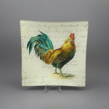 Load image into Gallery viewer, A hand signed decoupaged glass plate. Handmade in the United States by John Derian with a rooster image.  Approximately  5 3/4&quot; x 5 3/4&quot;  Very nice pre-owned condition, free of damage.