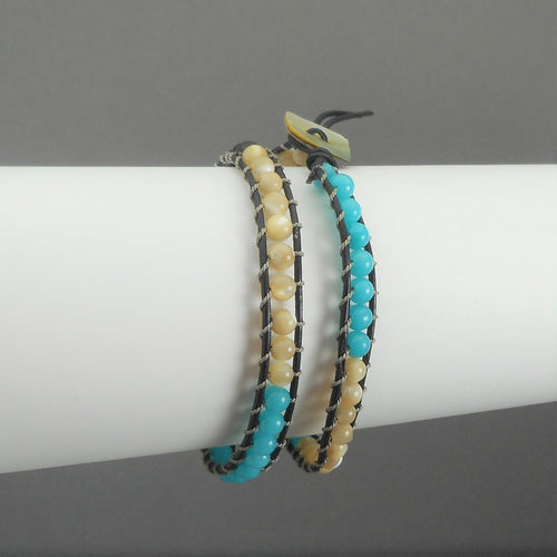 Unisex Leather and Opalescent Stone Bead Bracelet. In the style of Chan Luu, maker unknown, double wrap leather and stone bead friendship bracelet. It can be worn as a choker necklace as well (small size). Turquoise color stone beads FREE Shipping via USPS standard shipping to Continental US locations
