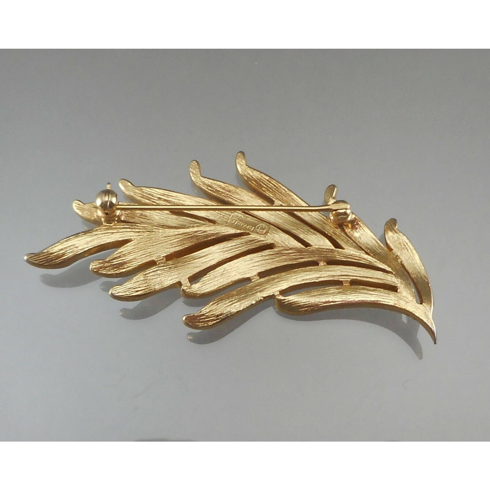 Vintage c 1960 Crown Trifari Brooch Gold Tone Feather Leaf Signed Desi –  Lori Bilodeau Antiques